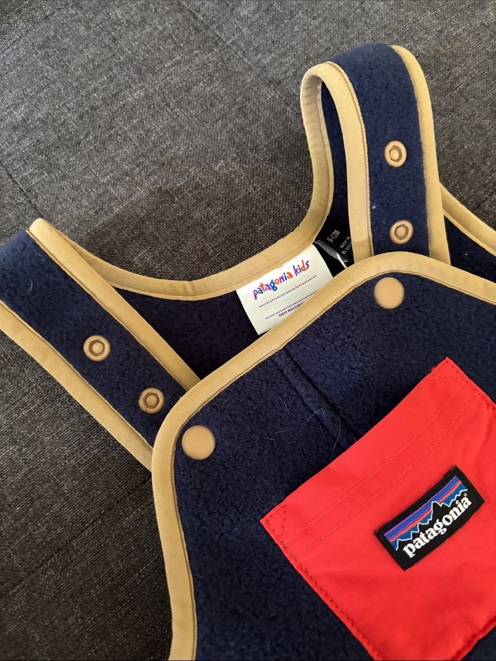 Patagonia Kids Synchilla Navy Fleece overalls with Red Pocket and Tan Trim - Picture 3 of 6